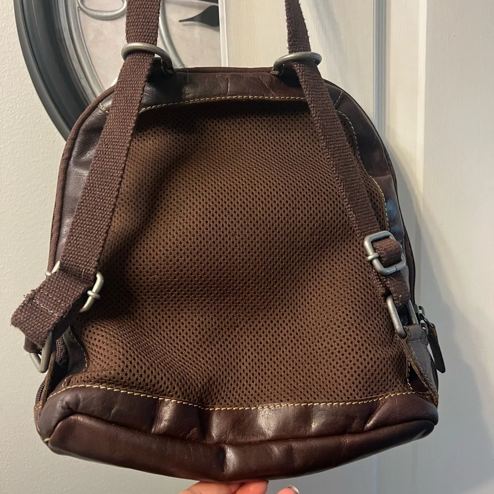 Jack George’s brown leather back pack